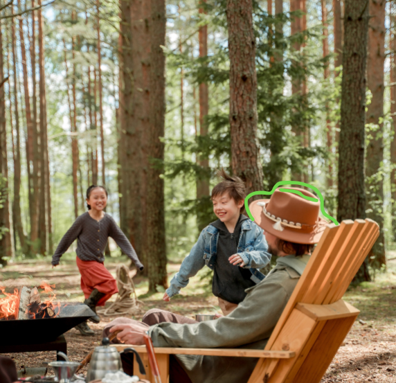 Man outside with children